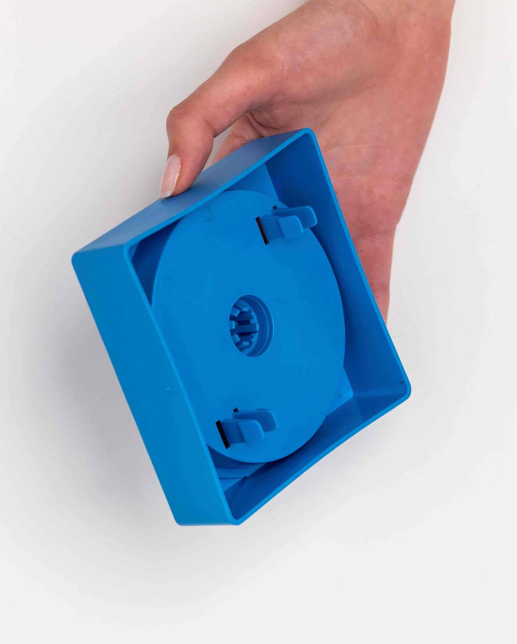Dessous du module bleu montrant le mécanisme de rotation