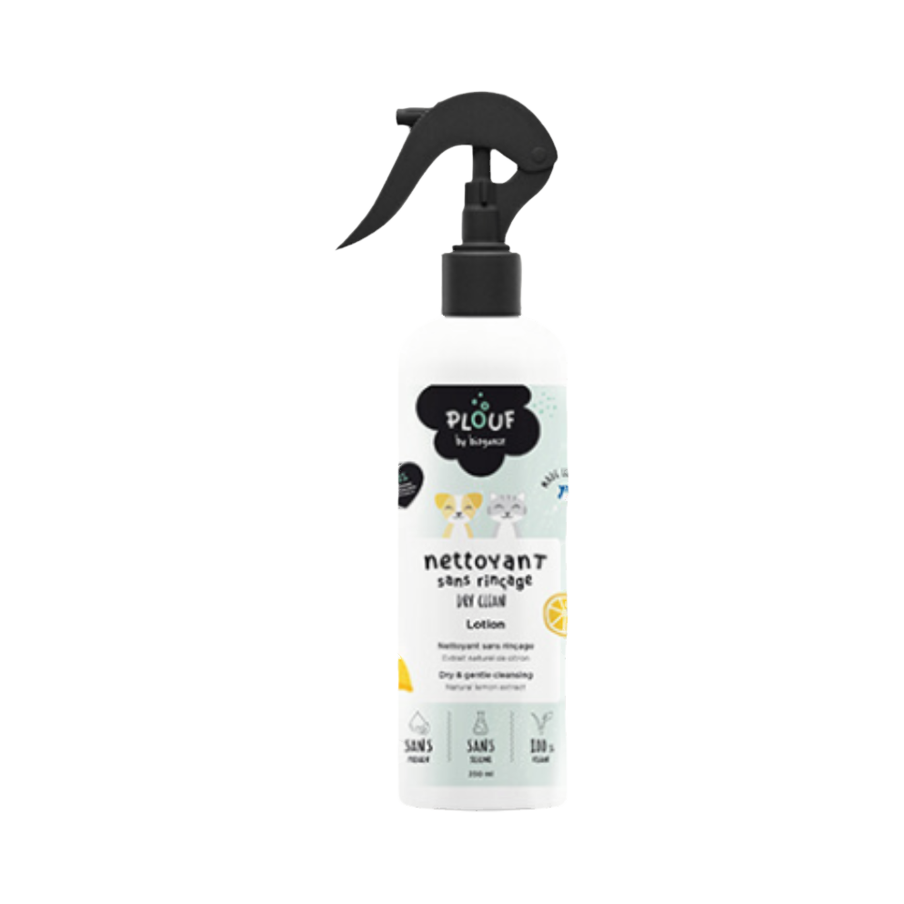 Flacon spray blanc à gâchette noire, étiquette illustrée d'agrumes