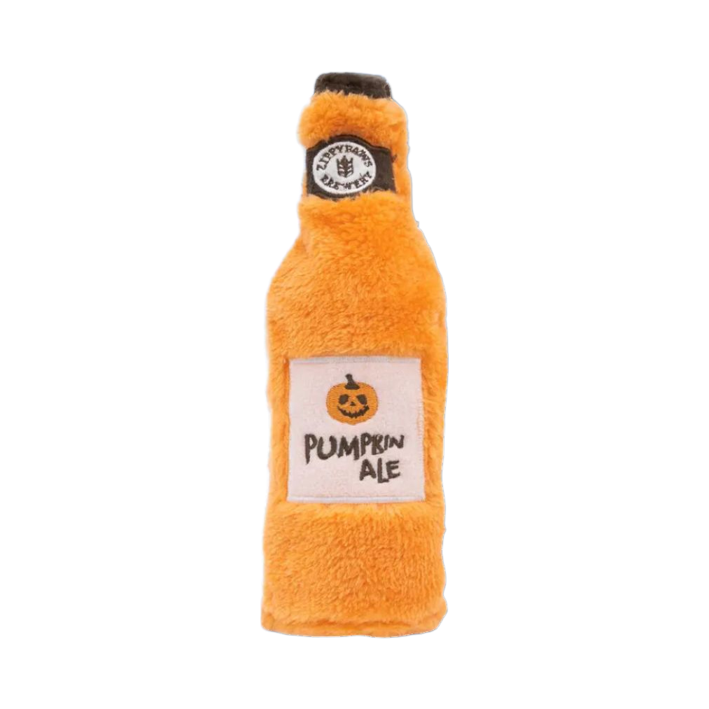 Bouteille orange à étiquette citrouille et bouchon noir