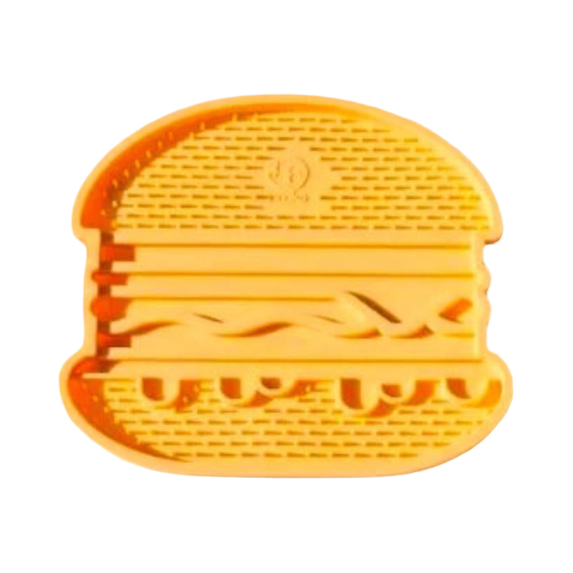 Tapis en silicone orange et jaune façon burger vu de dessus