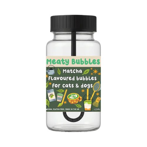 Flacon Meaty Bubbles à étiquette verte illustrée de tasses
