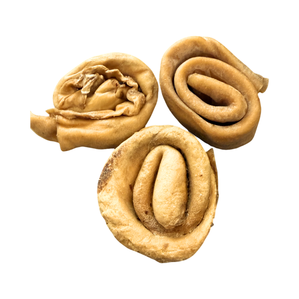 Trois donuts en peau d'agneau séchée roulée