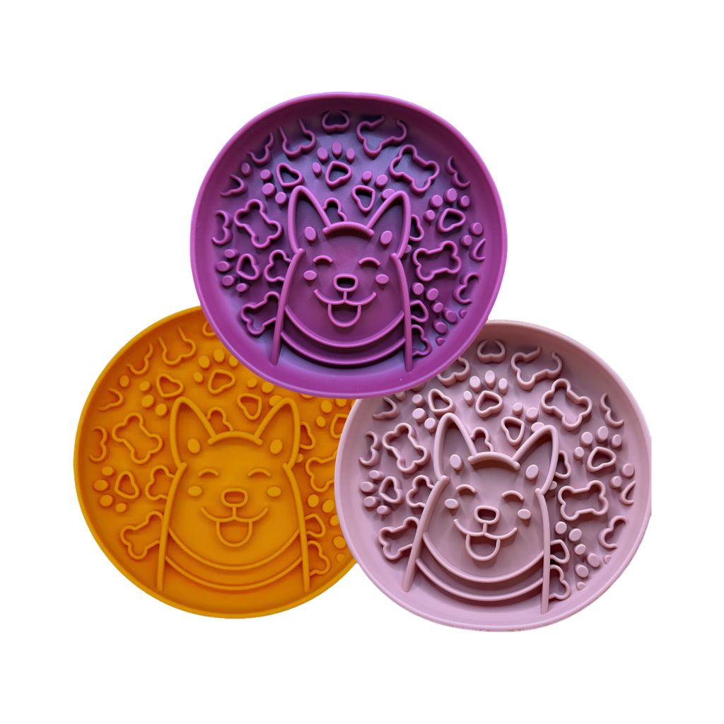Trois gamelles corgi violette, orange et rose empilées