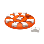 Disque orange avec neuf os blancs amovibles cachant les friandises