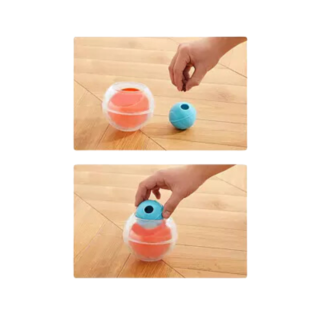 Mains qui garnissent la balle Rumble de croquettes puis la placent dans sa sphère