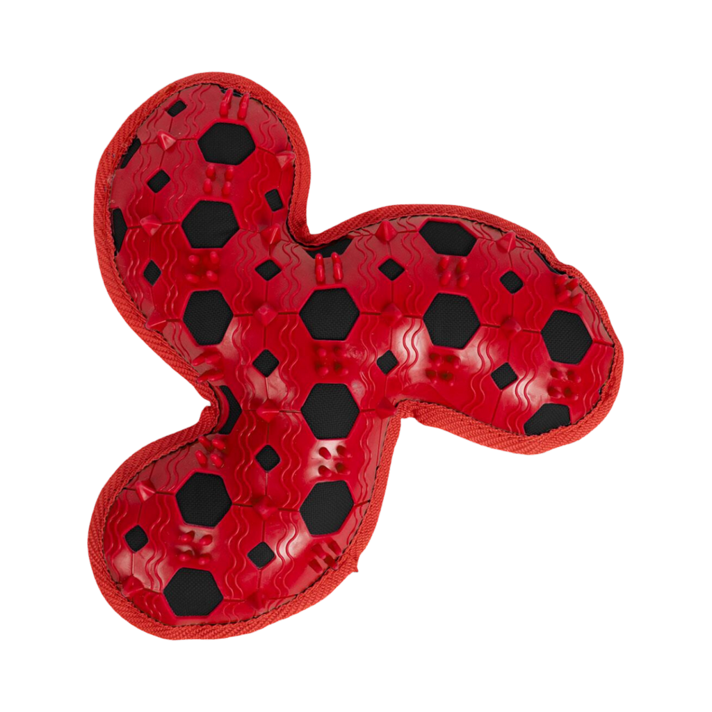 Dos rouge à picots et alvéoles noires du jouet trilobé