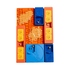 Plateau modulable orange, jaune et bleu garni de friandises