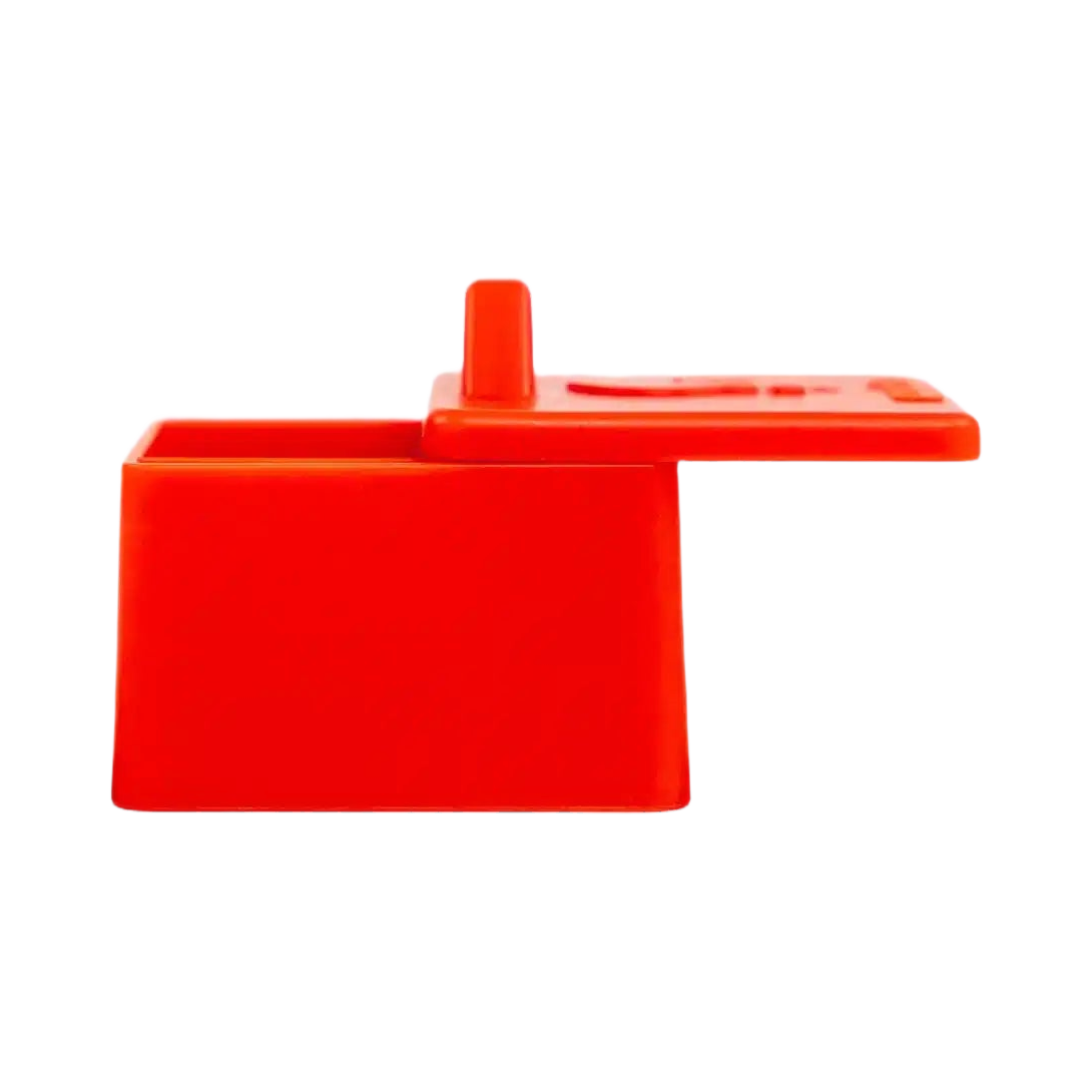 Vue de profil du bloc rouge et de son couvercle