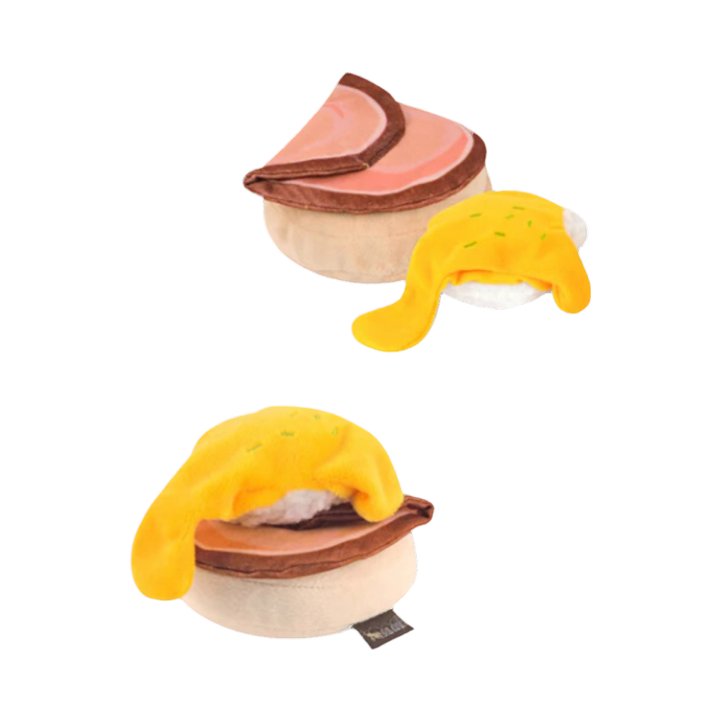 Deux œufs Bénédicte en tissu, jambon rose et sauce jaune