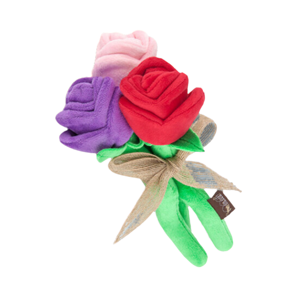 Trois roses rouge, violette et rose nouées d'un ruban beige