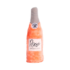 Bouteille corail pelucheuse au goulot gris et étiquette manuscrite