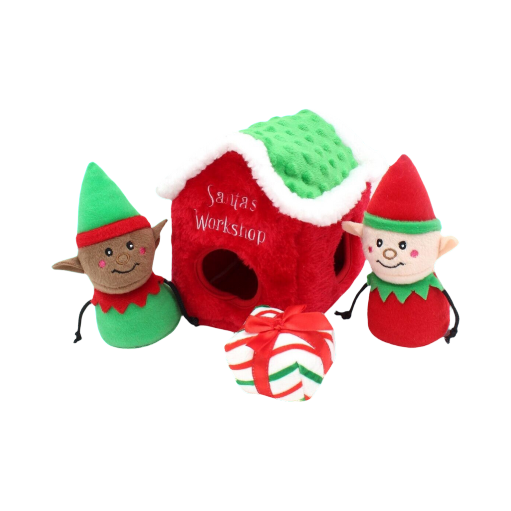 Maisonnette rouge au toit vert, deux lutins et un paquet cadeau