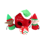 Maisonnette rouge au toit vert, deux lutins et un paquet cadeau