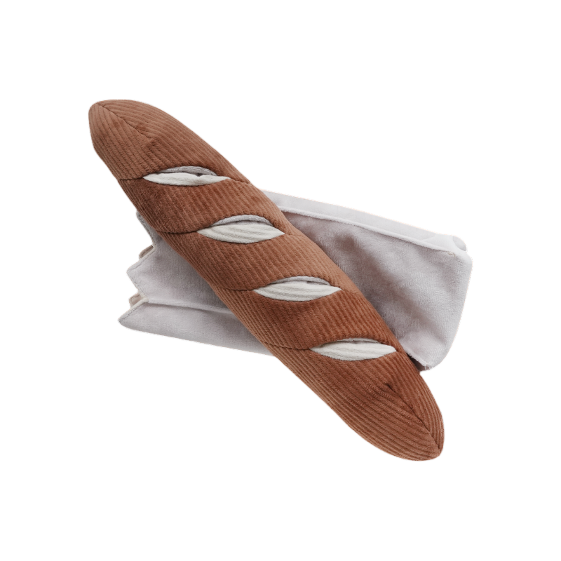 Pain marron en velours côtelé dans son sac en tissu blanc