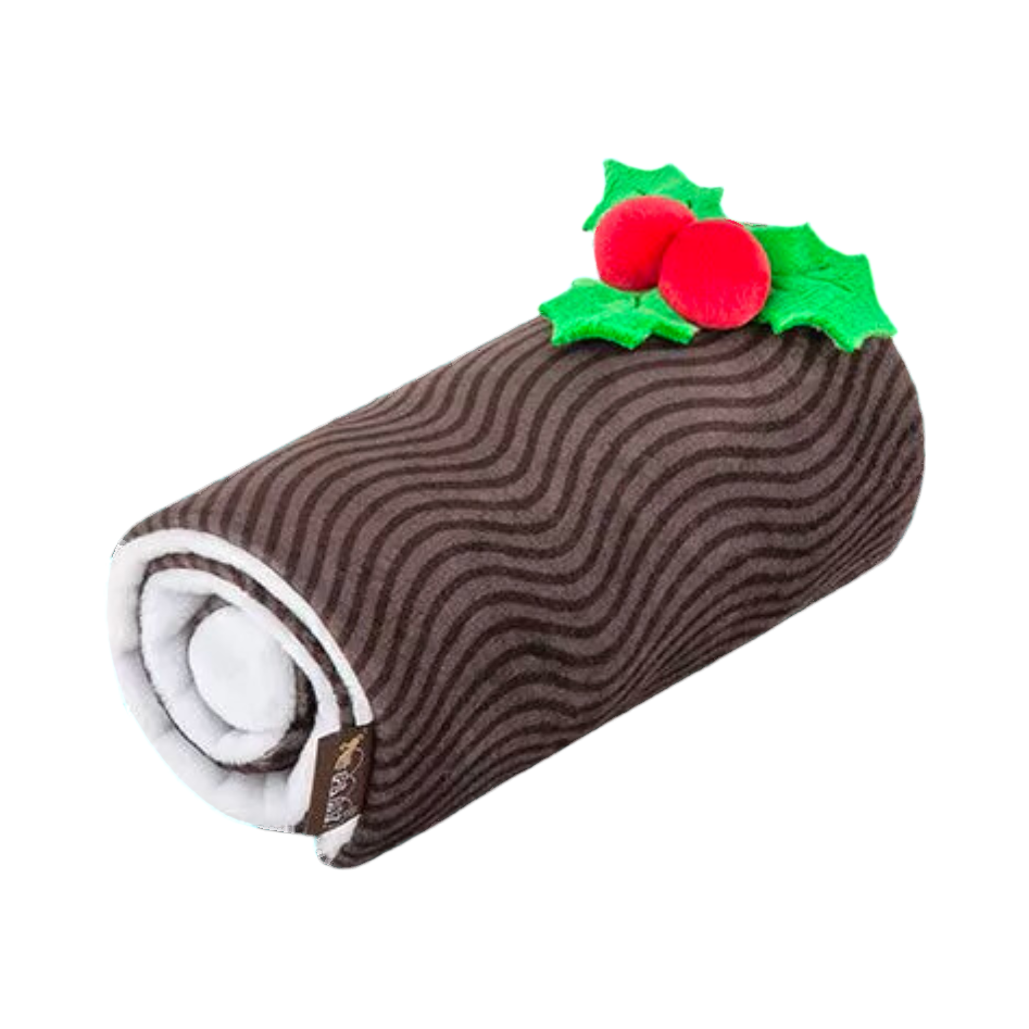 Bûche brune roulée ornée de houx et de baies rouges