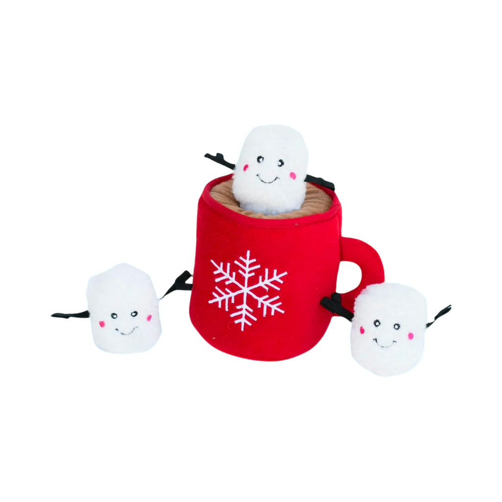Tasse rouge à flocon blanc et ses trois guimauves
