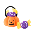 Panier citrouille orange à anse noire avec bonbons violets