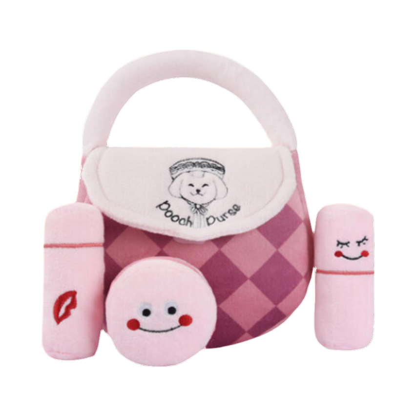Sac rose à damier avec rouge à lèvres, poudrier et flacons en peluche