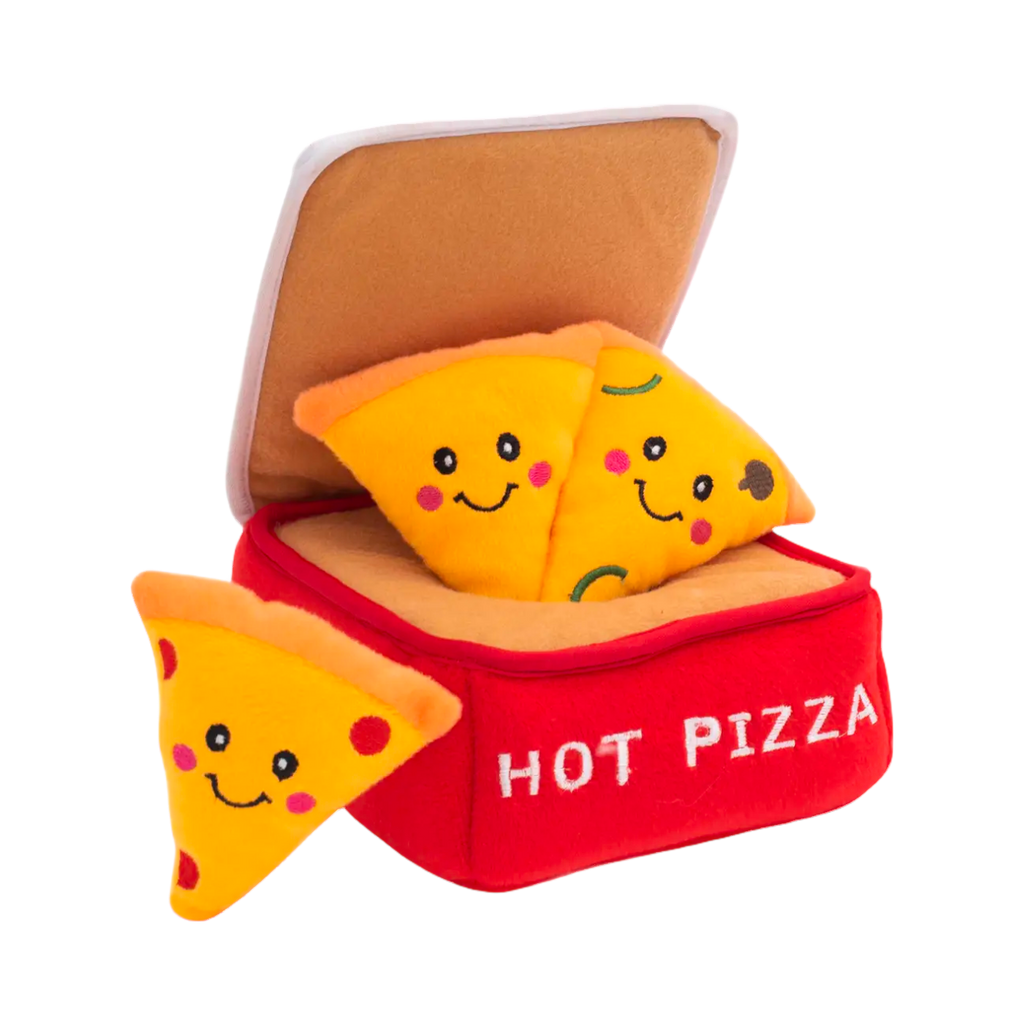 Parts de pizza glissées dans la boîte rouge ouverte