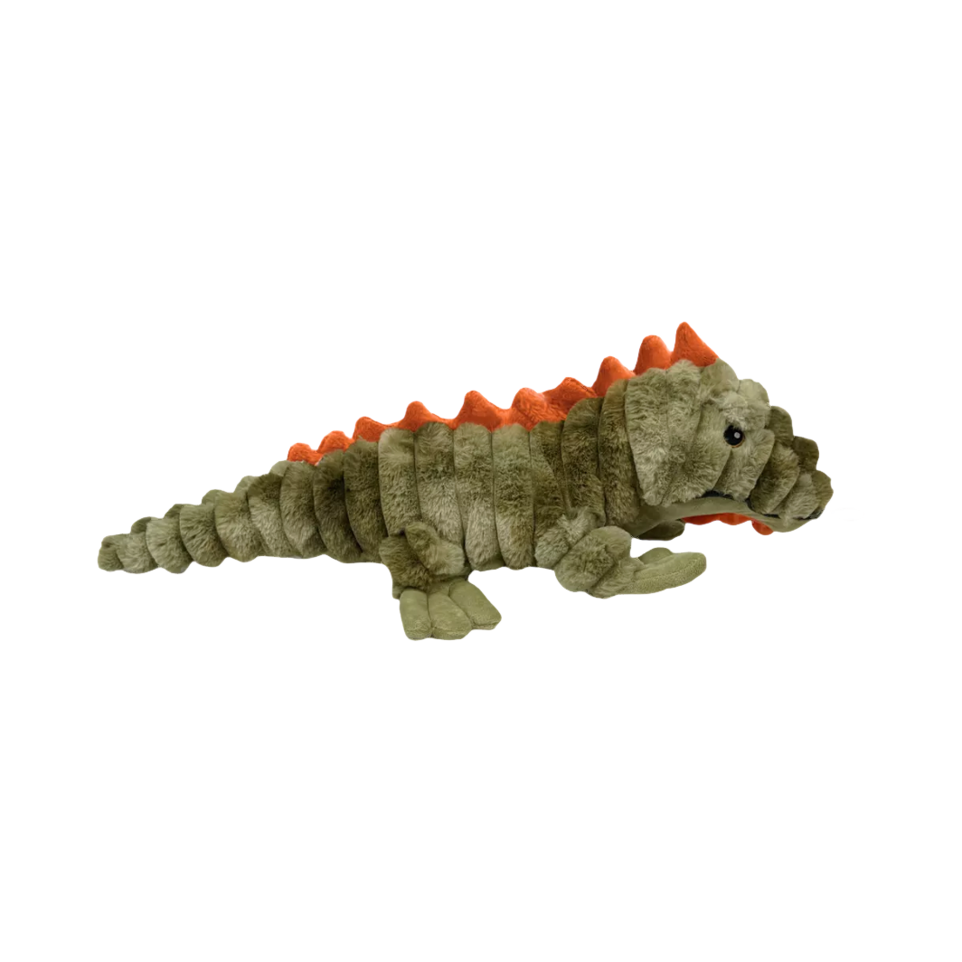 Lézard kaki allongé de profil, crête orange sur le dos