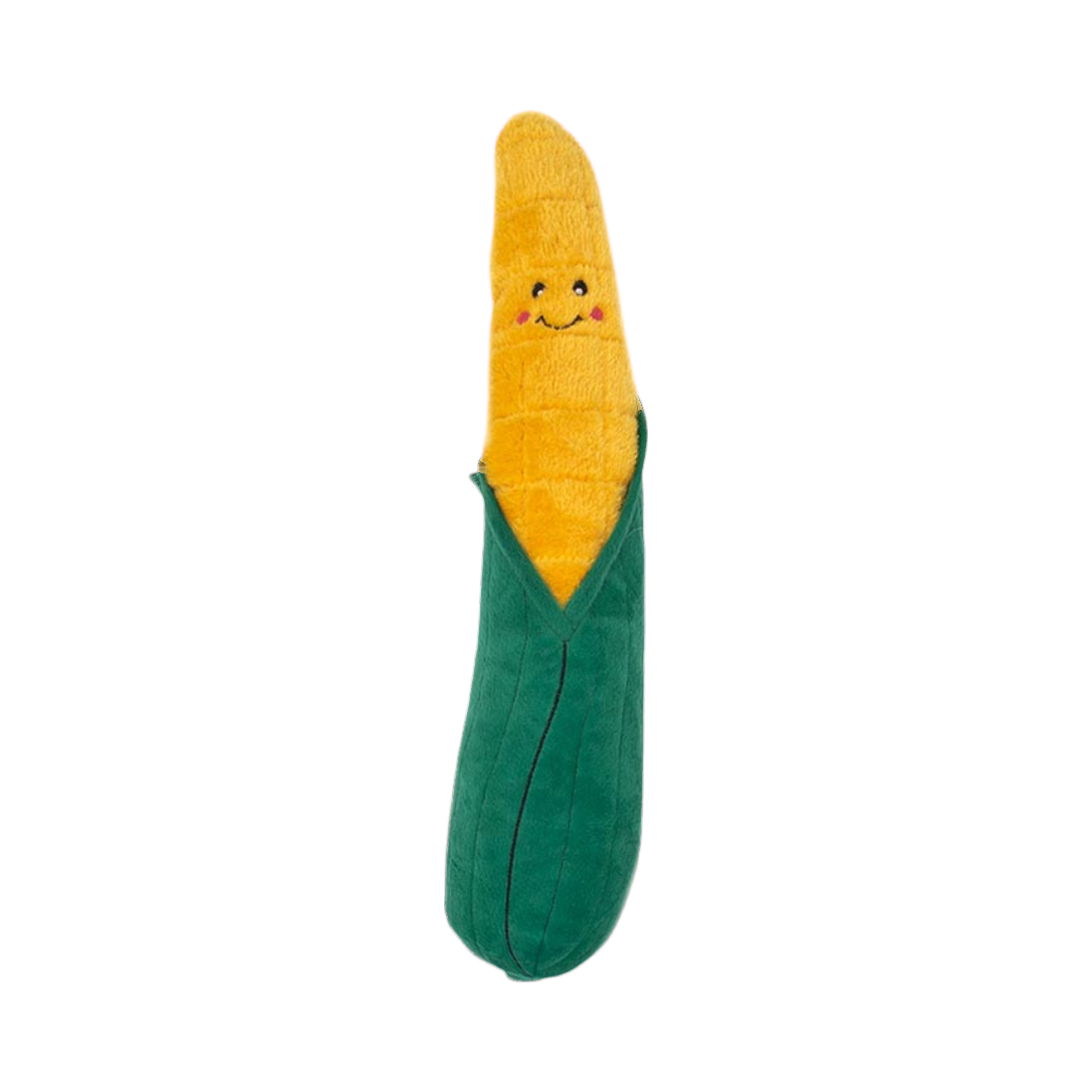 Épi jaune souriant enveloppé de feuilles vertes