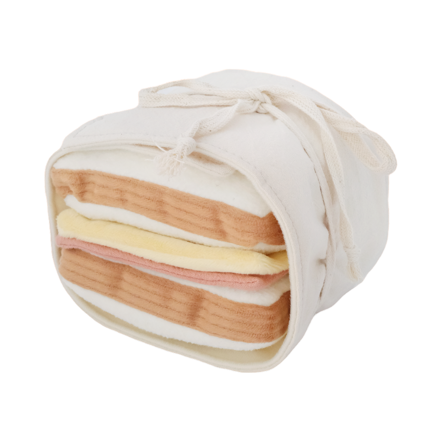 Sandwich crème en tissu avec tranches de jambon et fromage