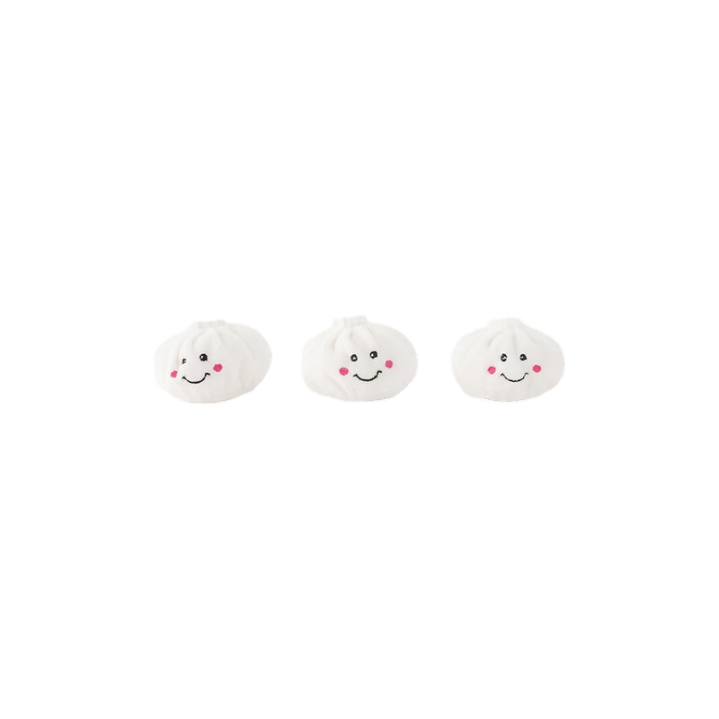 Trois petits baos blancs aux joues roses alignés