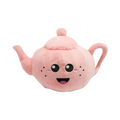 Théière rose poudré au visage souriant et taches de rousseur