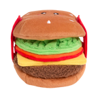 Pain, salade, tomate, fromage et steak enfilés sur une sangle