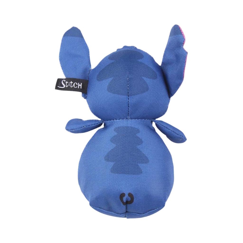 Dos bleu du personnage avec étiquette cousue sur le côté