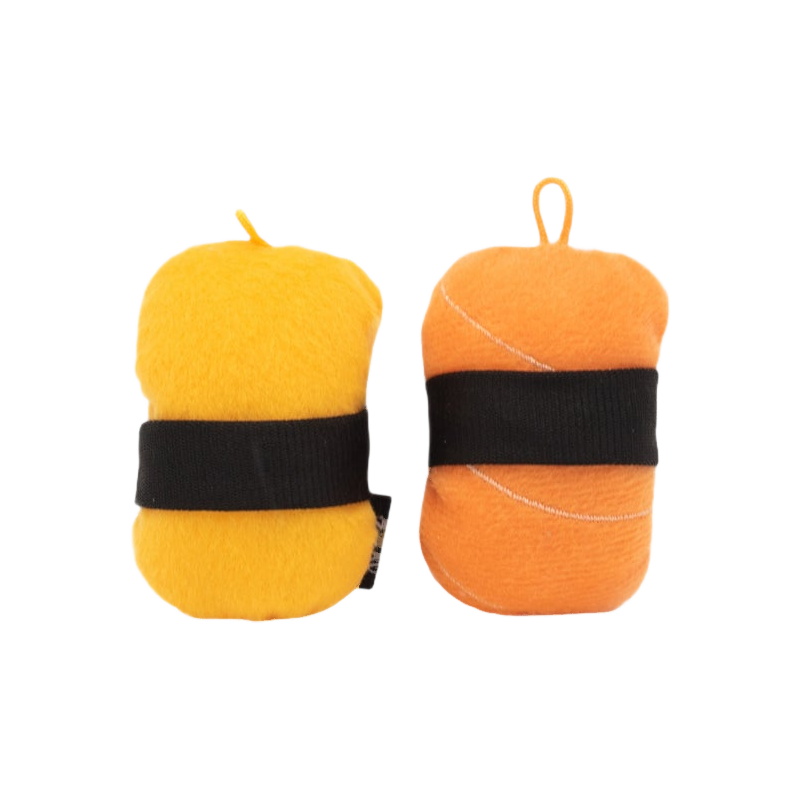 Deux sushis jaune et orange debout, vue de côté