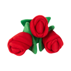 Trio de roses rouges aux feuilles vertes, vu de dessus