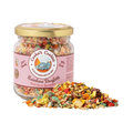 Bocal en verre étiquette rose, confettis colorés à ses pieds