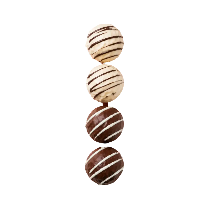 Quatre boules rayées noir et blanc alignées