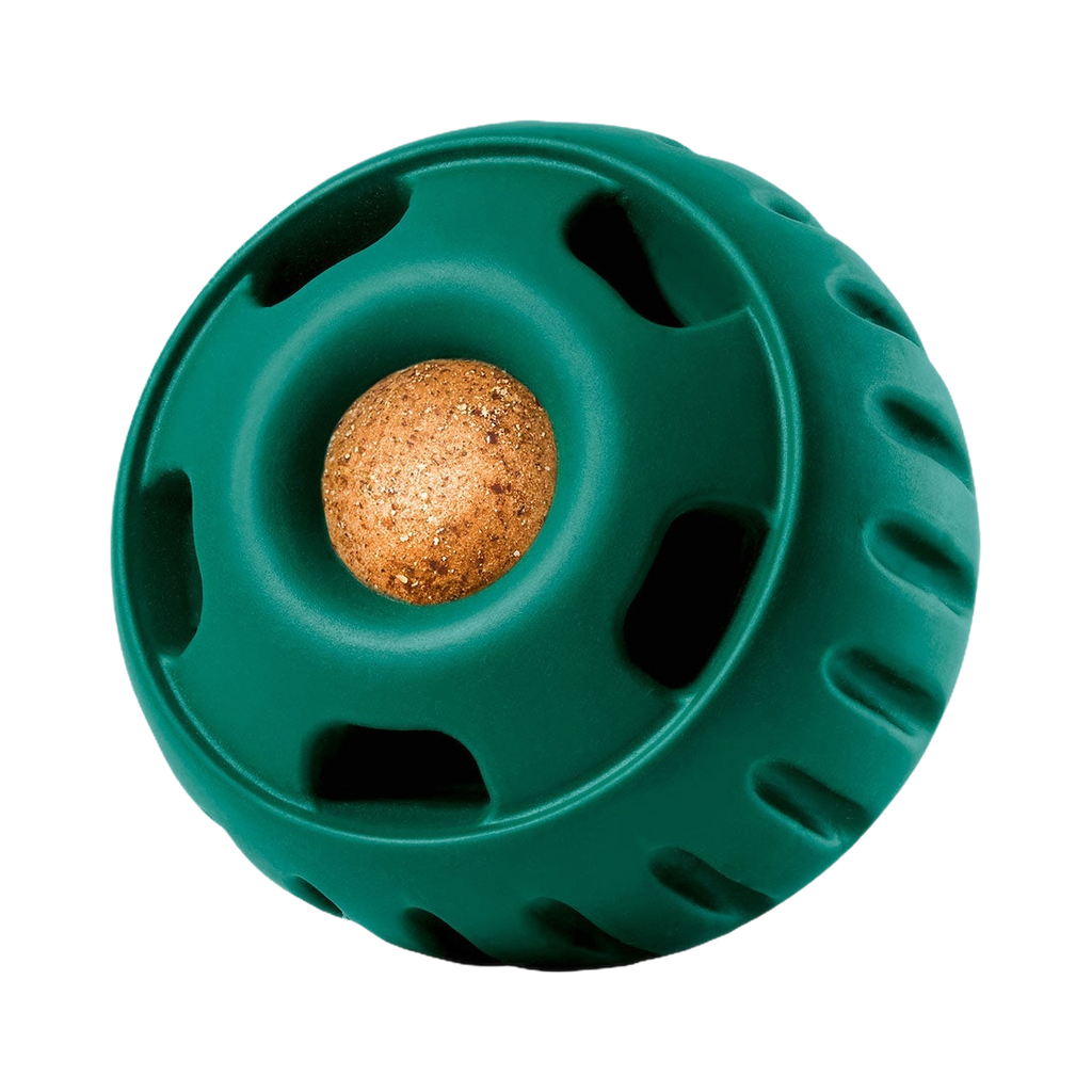 Boule vert sapin ajourée garnie d'une friandise ronde